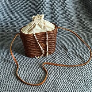 Brown Woven Crossbody Bag with Cream Drawstring